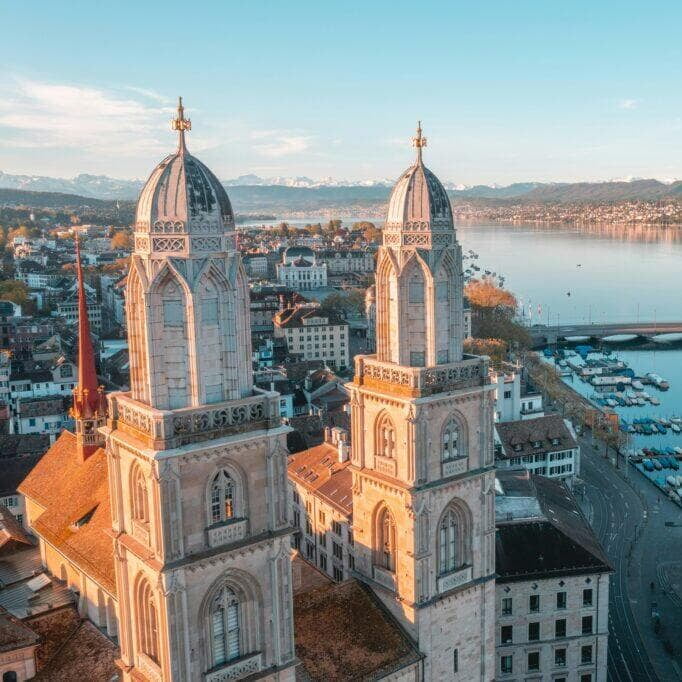 the Grossmünster in Zurich, Switzerland, with its twin towers rising above the surrounding cityscape