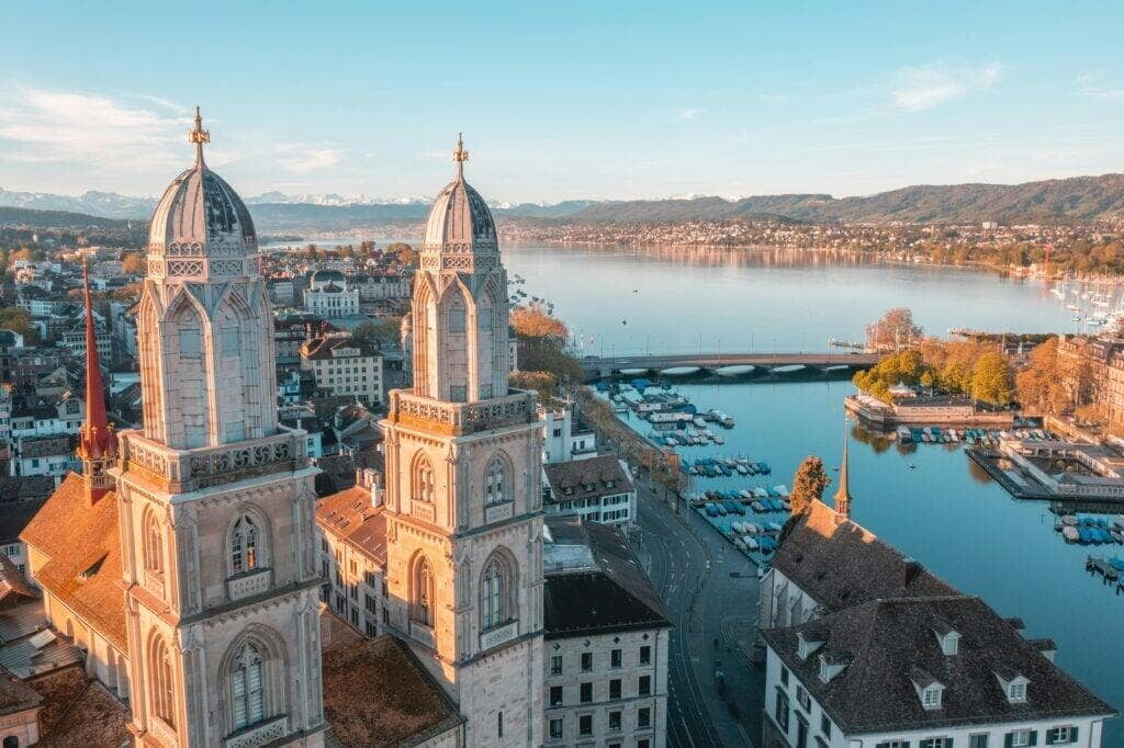 the Grossmünster in Zurich, Switzerland, with its twin towers rising above the surrounding cityscape