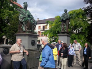 Bob Kelly sharing with the group in Worms at the Reformers Monument